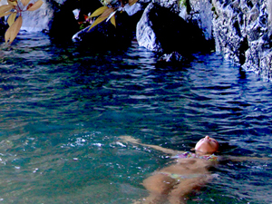 private swimming hole in rainforest